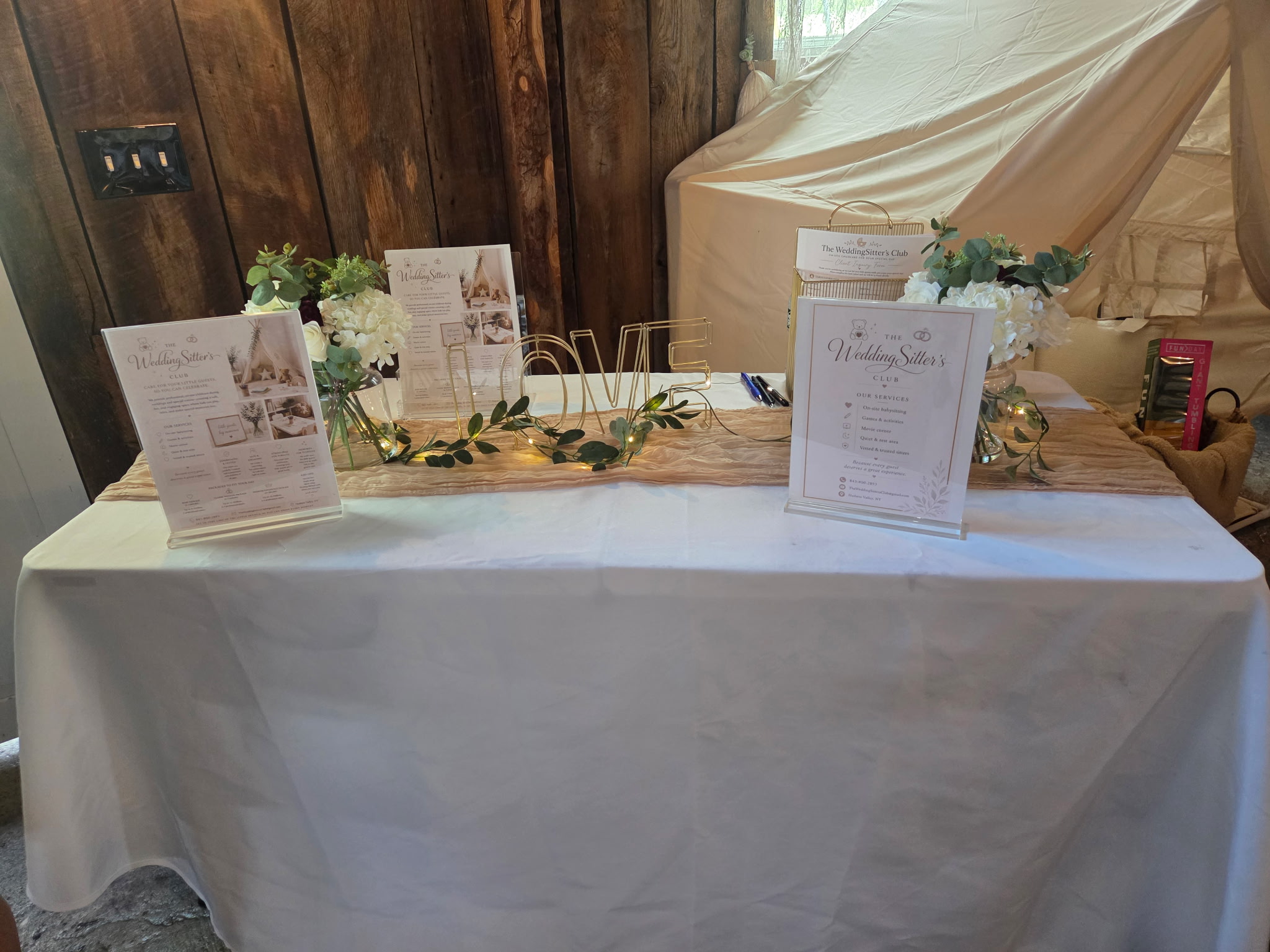 Children’s wedding lounge tent and table